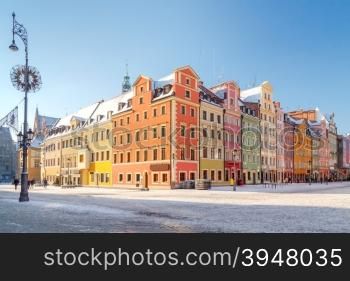Multi-colored facades of old houses in the historic center of Wroclaw.. Wroclaw. Market Square.