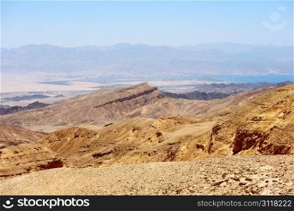 Multi-colored mountains in the south of Israel, the descent to the Gulf of Eilat Red Sea
