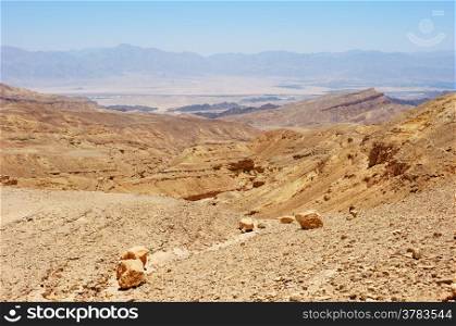 Multi-colored mountains in the south of Israel, the descent to the Gulf of Eilat Red Sea