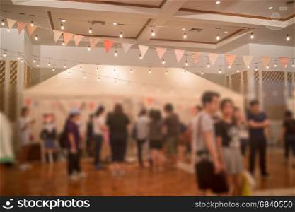 Multi colored triangle flags hanging indoor party, stock photo