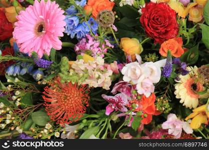 Multi colored wedding flowers in a decorative arrangement