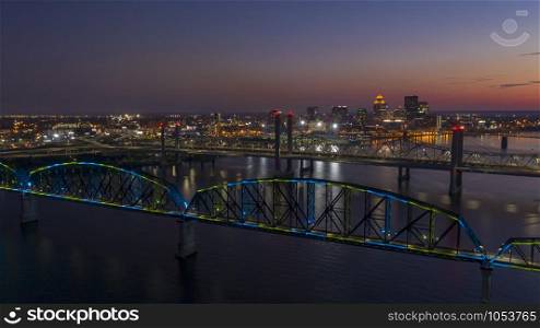 Multi Colors of light hit the Big Four bridge before sunrise around Lousville Kentucky