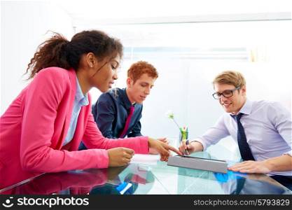Multi ethnic teamwork of young business people meeting working at office