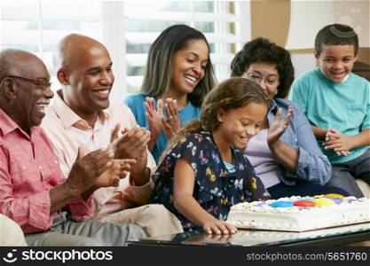 Multi Generation Family Celebrating Daughter&#39;s Birthday