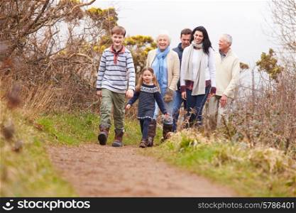Multi Generation Family On Countryside Walk