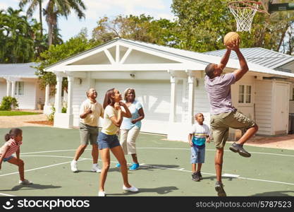 Multi Generation Family Playing Basketball Together