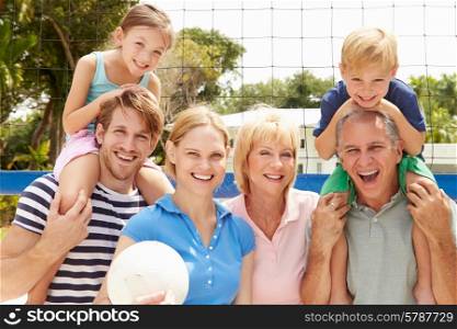 Multi Generation Family Playing Volleyball Together