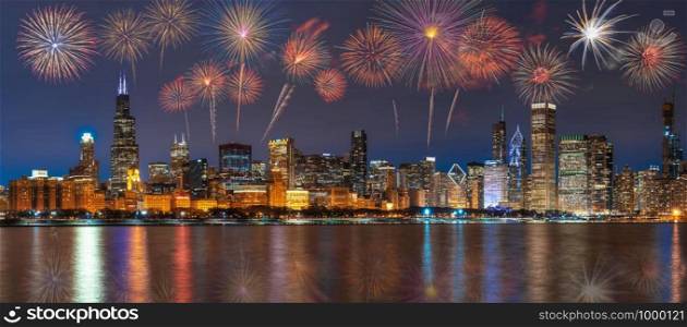 Multicolor Firework Celebration over the Panorama of Chicago Cityscape river side along Lake Michigan at beautiful twilight time, Illinois, United States, 4th of July and Independence day concept