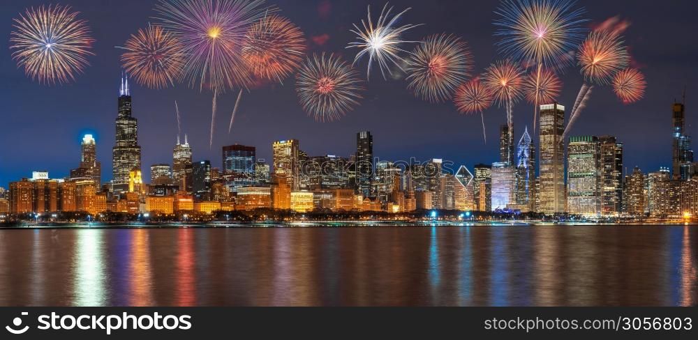Multicolor Firework Celebration over the Panorama of Chicago Cityscape river side along Lake Michigan at beautiful twilight time, Illinois, United States, 4th of July and Independence day concept
