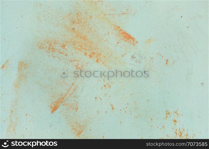 Multicolored abstract background: old rusty metal surface with blue paint flaking and cracking texture