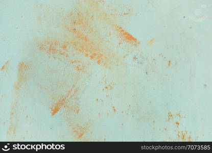 Multicolored abstract background: old rusty metal surface with blue paint flaking and cracking texture