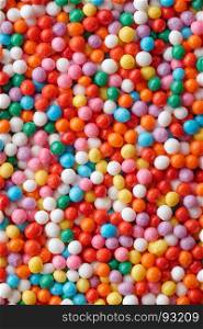 Multicolored candy drops. Backgrounds and textures: a lot of multicolored candy drops, confectionery abstract