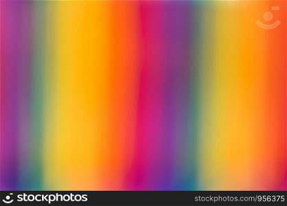Multicolored defocused textured background with rainbow colors
