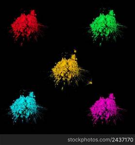 multicolored holi colors decorated black background