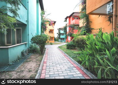 Multicolored houses along the stone-paved paths. Multicolored houses along paths