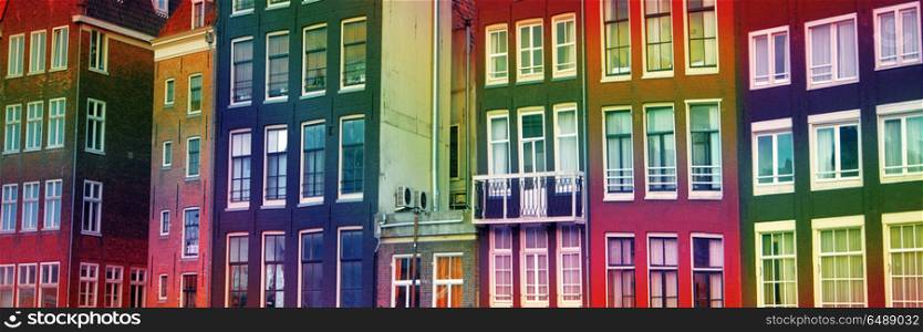 multicolored rainbow houses. Traditional old buildings in Amsterdam, the Netherlands. multicolored rainbow houses.