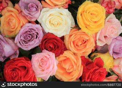 Multicolored roses in a floral wedding decoration