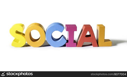 Multicolored text social made of wood. White background