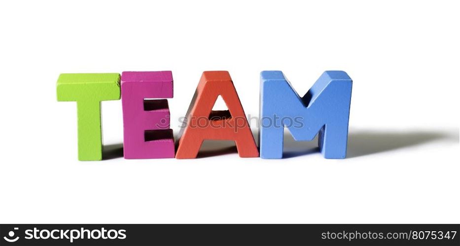 Multicolored text team made of wood. White background