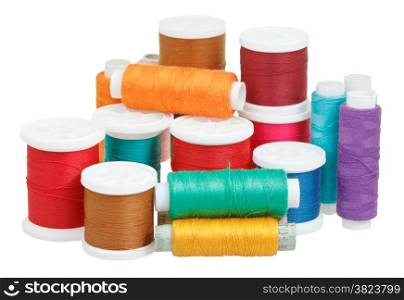 multicolored thread bobbins isolated on white background