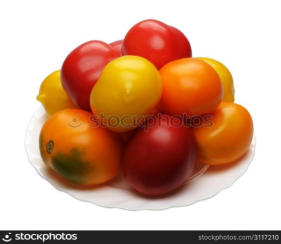 Multicolored tomatoes, isolated on a white background