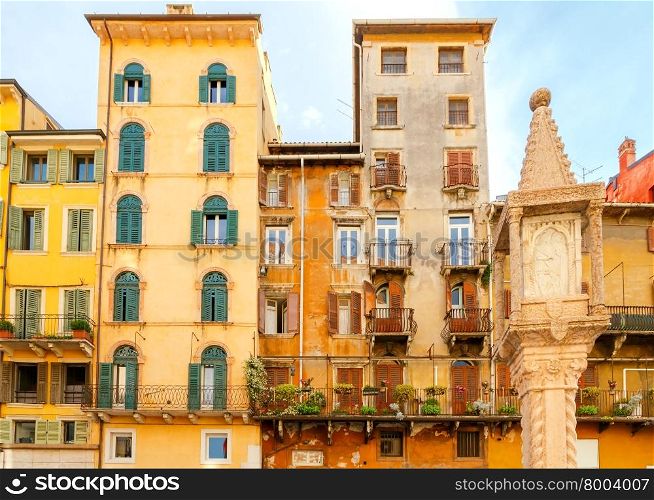 Multicolored traditional facades of old houses in Verona. Italy.. Verona. Facades of old houses.
