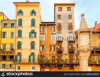 Multicolored traditional facades of old houses in Verona. Italy.. Verona. Facades of old houses.