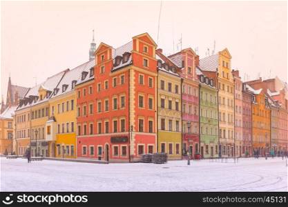 Multicolored traditional historical houses on Market square in the winter morning, Old Town of Wroclaw, Poland