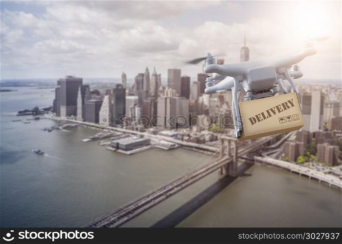Multicopter flying over New York City. unmanned Multicopter drone flying with package over lower Manhatten, New York City