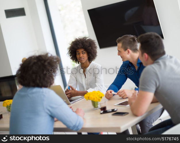 Multiethnic Group of business people discussing business plan in the startup office