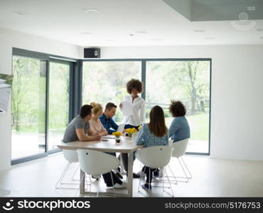 Multiethnic Group of business people discussing business plan in the startup office