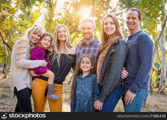 Multigenerational Mixed Race Family Portrait Outdoors.