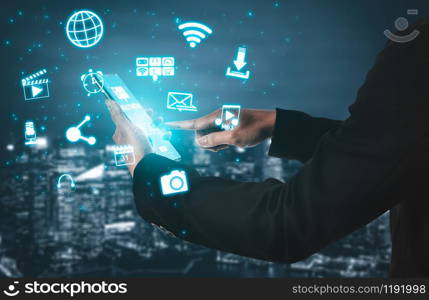 Multimedia and Computer Applications Concept. Business people using technology of digital gadget with modern graphic interface showing social, shopping, camera and multimedia application on device.