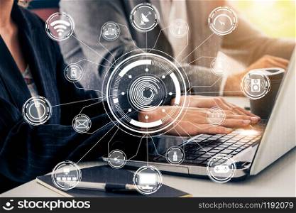 Multimedia and Computer Applications Concept. Business people using technology of digital gadget with modern graphic interface showing social, shopping, camera and multimedia application on device.