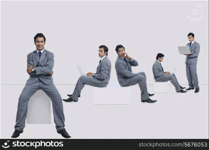 Multiple image of businessman performing various tasks against white background