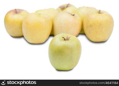 Multiple yellow apples isolated on white background