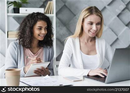 multiracial employees working laptop