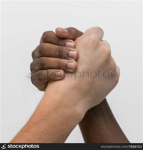 multiracial hands coming together 1 . Resolution and high quality beautiful photo. multiracial hands coming together 1 . High quality and resolution beautiful photo concept