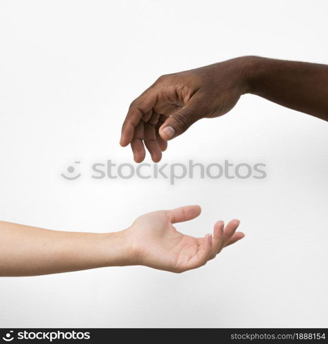 multiracial hands coming together. Resolution and high quality beautiful photo. multiracial hands coming together. High quality and resolution beautiful photo concept