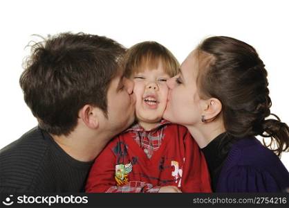Mum and the daddy kiss the son. It is isolated on a white background