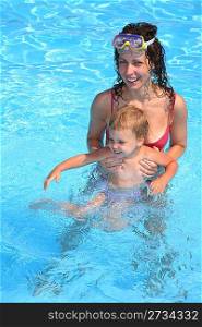 Mum and the son in pool