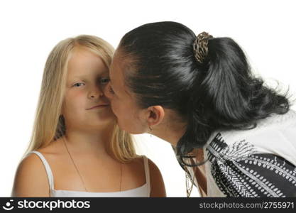 Mum kisses the daughter. It is isolated on a white background