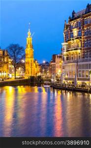 Munttoren Tower at Muntplein square Amsterdam Netherlands at dusk