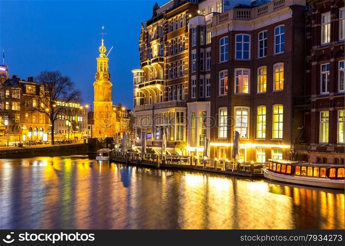 Munttoren Tower at Muntplein square Amsterdam Netherlands at dusk