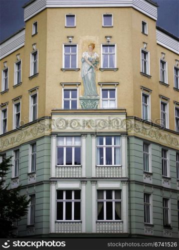 Mural Berlin apartment house. designed building facade on a house in Berlin-Mitte