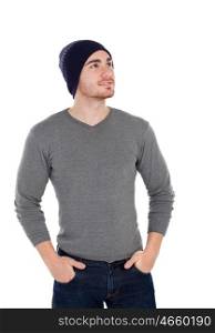 Muscled man with wool hat lookin up isolated on a white background