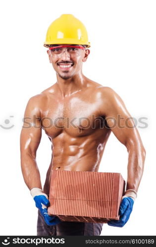 Muscular builder with bricks on white