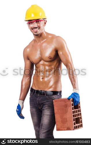 Muscular builder with bricks on white