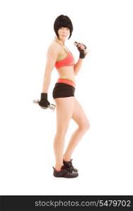 muscular fitness instructor with dumbbells over white
