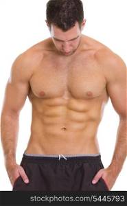 Muscular guy showing abdominal muscles